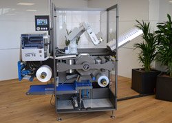 Thermo-packaging machine achieved using Mitsubishi technologies