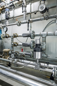 Precision flow control for efficient, accurate pneumatic conveying systems